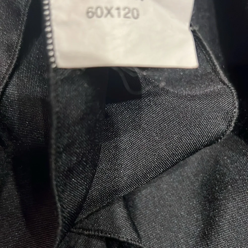 Black cloth table covering 60 by 120